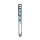 0.10CT DIAMOND & 0.10CT EMERALD BAND