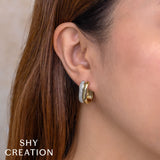 0.33CT DIAMOND OVAL HOOP EARRING