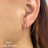 0.08CT DIAMOND OVAL HOOP EARRING