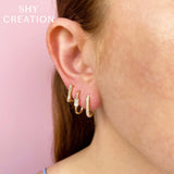 0.18CT DIAMOND OVAL HOOP EARRING
