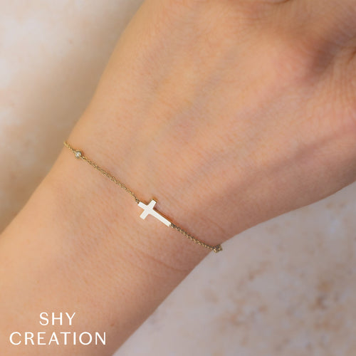 0.03CT DIAMOND BEZEL CROSS BRACELET
