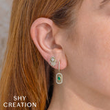 0.41CT DIAMOND & 0.29CT EMERALD OVAL EARRING